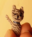 http://www.ravelry.com/patterns/library/micron-the-kitty
