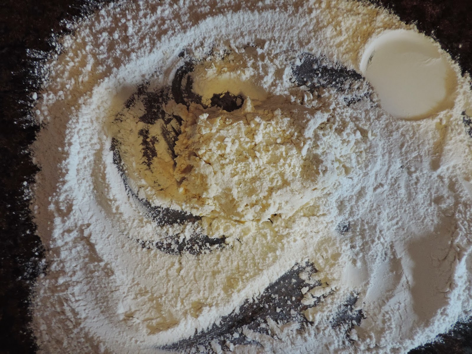 The noodle dough on the floured surface. 