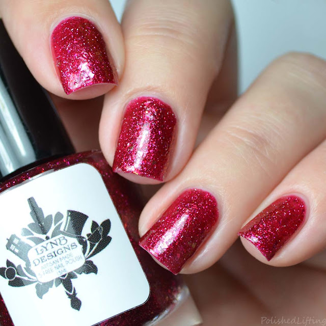 red nail polish with iridescent flakies
