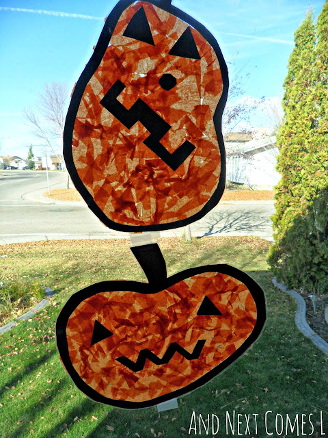 Simple jack-o-lantern pumpkin Halloween suncatcher craft for kids