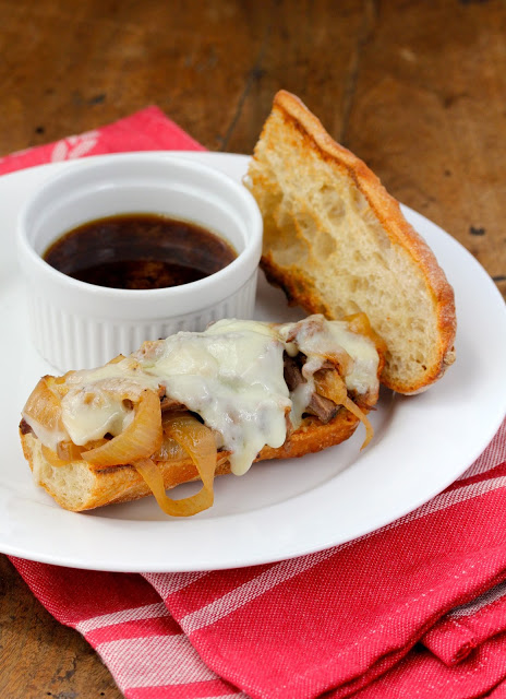 Featured Recipe | Slow Cooker French Dip Sandwich au Jus from Karen's Kitchen Stories #SecretRecipeClub #recipe #crockpot #frenchdip #sandwiches