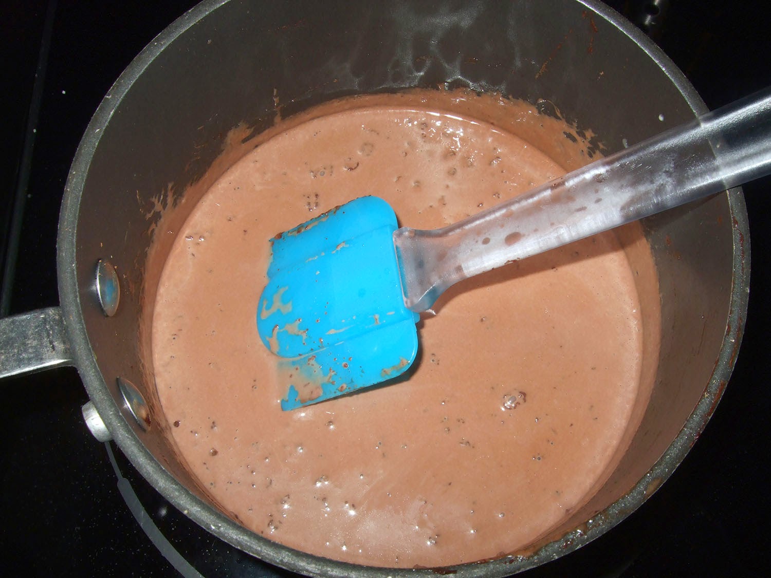 Cocoa mized into heavy cream.