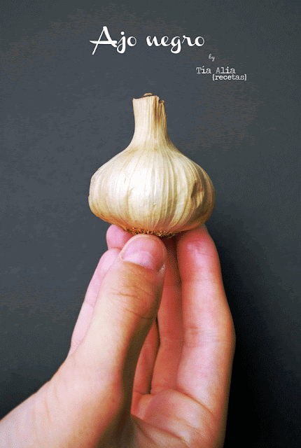 Risotto negro vieira plancha crujiente parmesano