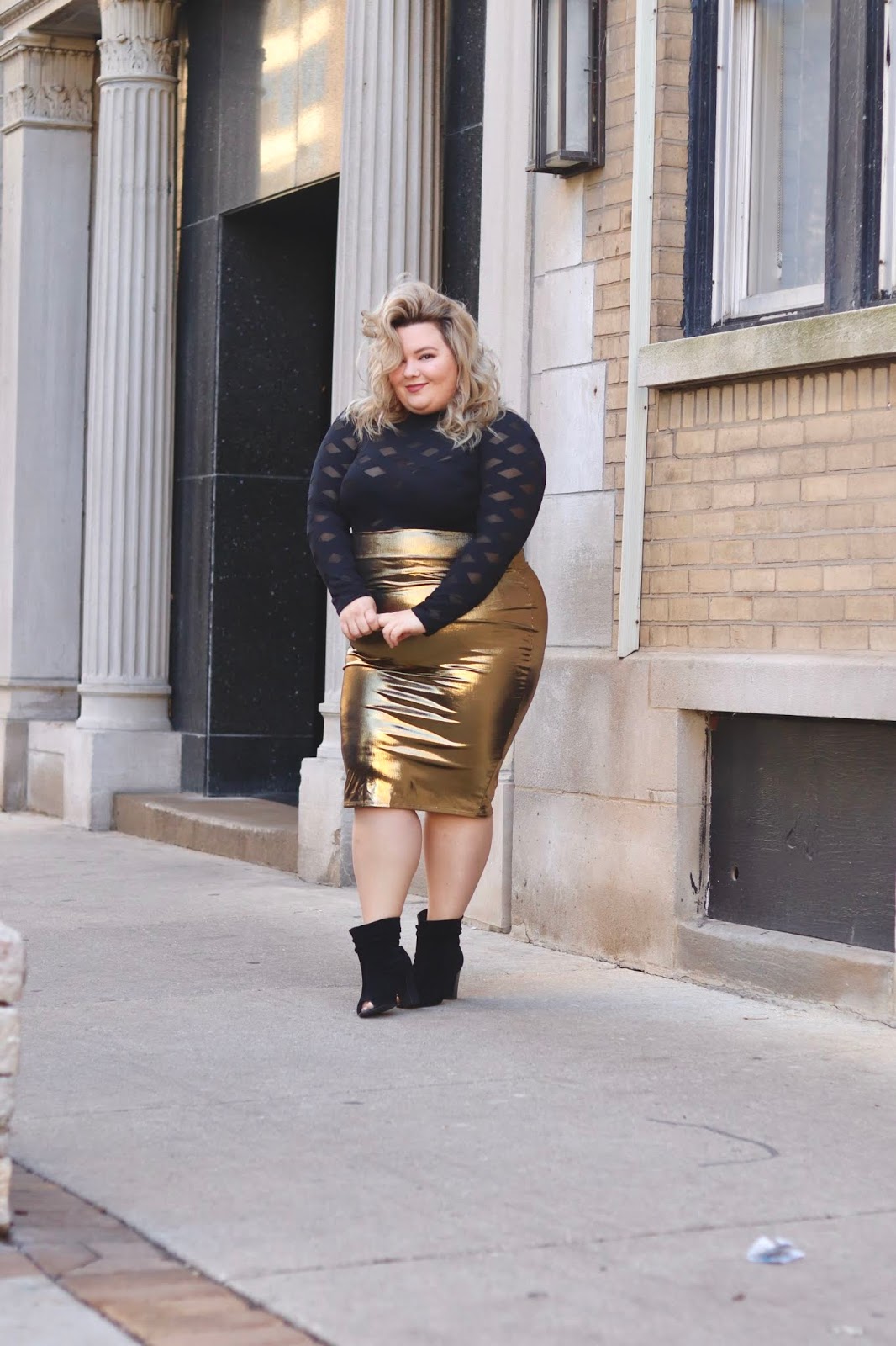 Chicago Plus Size Petite Fashion Blogger and model Natalie Craig reviews Fashion Nova Curve's Edges That Scratch Bodysuit and Heart of Gold Midi Skirt. Plus size New Years eve outfits 2019