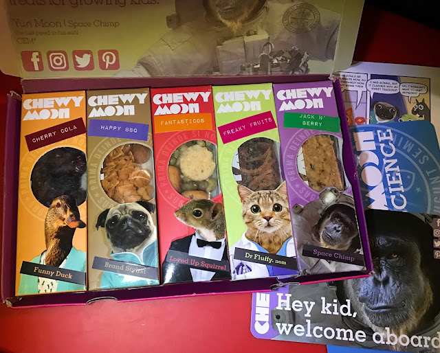 An open ChewyMoon box showing 5 different snack boxes and a message saying Hey kid, welcome aboard