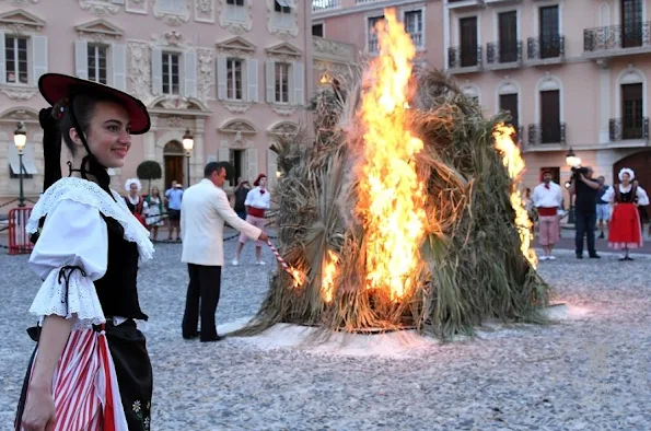 Princess Charlene and Prince Albert of Monaco watched the traditional celebrations of St. John's Day procession (Fête de la Saint-Jean) at Palace Square in Monaco