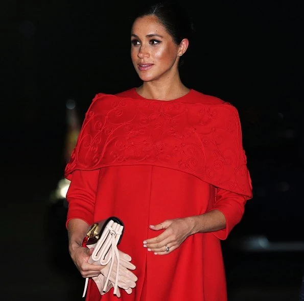 Meghan Markle wore bespoke Valentino dress with nude heels, gloves and a Valentino clutch bag