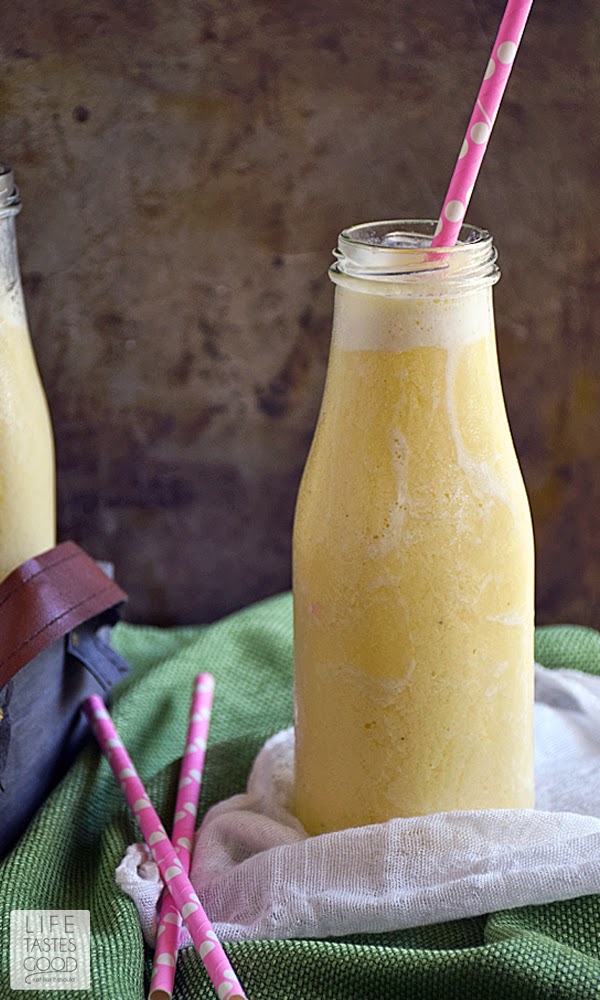Pineapple Banana Smoothie | by Life Tastes Good is just over 100 calories and a tasty anytime snack that is super easy to make, refreshing, and satisfies your sweet tooth!