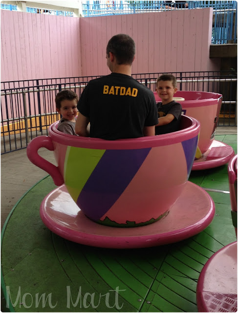 BATDAD with the boys in a little pink teacup ride at Six Flags