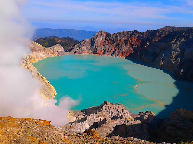 Ijen Morning Tour | Ijen Crater Tour Ijen Morning Tour Banyuwangi, visit to ijen crater volcano east java ( kawah ijen ) in morning day, it’s good time to see the beauty of the lake, active volcano of Ijen crater and see direct traditional miners work every day in the ijen take the sulfur from crater, for by the turist travel to ijen crater volcano can be from : ijen crater from bali, ijen crater from Surabaya, ijen crater from banyuwangi, beside in morning day the ijen itself has beauty of the lake, is also in the night day (ijen night tour), the ijen crater itself has uniqueness of blue fire ( blue flame), in Indonesia mention it (api biru ) which is because the outburst gas from active volcano Ijen sulphur containing methane gas, so it produces blue fire, and the occurrence of blue fire ijen only at night day (ijen blue fire tour). Ijen tour price in morning day at the time normaly day is : Rp. 600.000/person. At the time is weekend the price is differend, ijen crater, ijen crater tours, ijen Tour Package, kawah ijen tours, ijen tour and travel banyuwangi, ijen volcano tour, ijen volcano Indonesia, ijen volcano from banyuwangi, ijen travel, kawah ijen banyuwangi, kawah ijen tour, kawah ijen trip, ijen crater tour, ijen crater blue fire, ijen crater guesthouse, ijen crater tour from banyuwangi, ijen crater tour bali, ijen crater tour price, ijen crater night tour, kawah ijen night, ijen blue fire, bluefire ijen crater, blue fire ijen tour , blue fire kawah ijen, ijen blue flame tour, blue flame gunung ijen, blue flame sulphur ijen, blue flame gunung ijen, blue flame kawah ijen volcano.