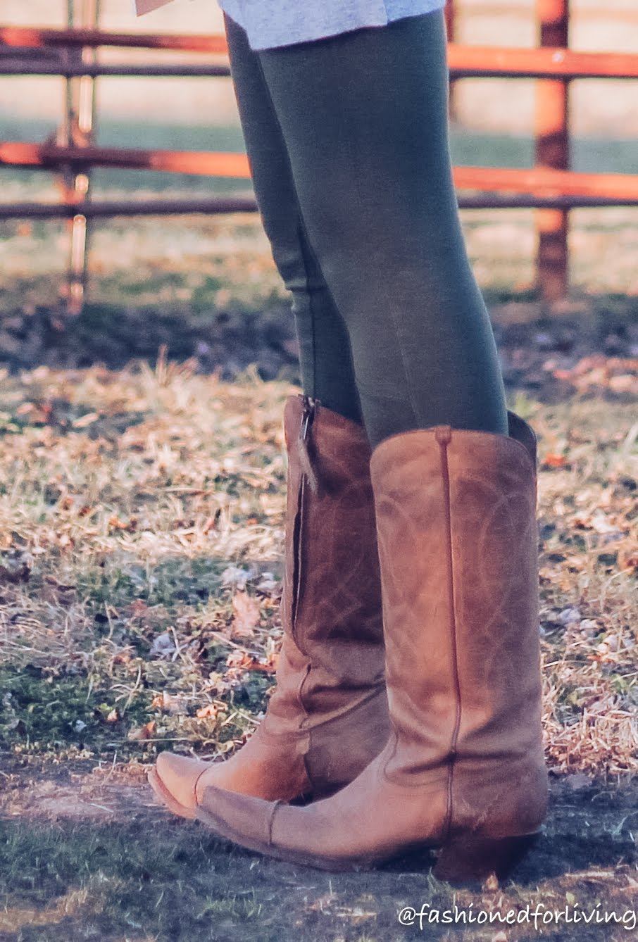olive green leggings outfit - sweater dress, shearling vest and tall cowgirl boots