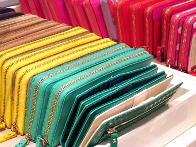 Kate Spade colourful patent leather purses