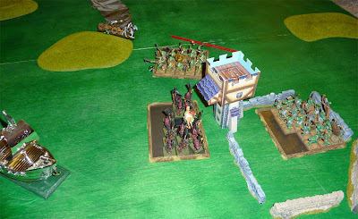 A Warhammer Fantasy Battle Report between Warriors of Chaos and Savage Orcs.