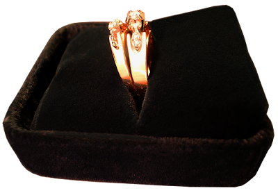 Wedding Set An engagement ring and wedding band in black velvet box.