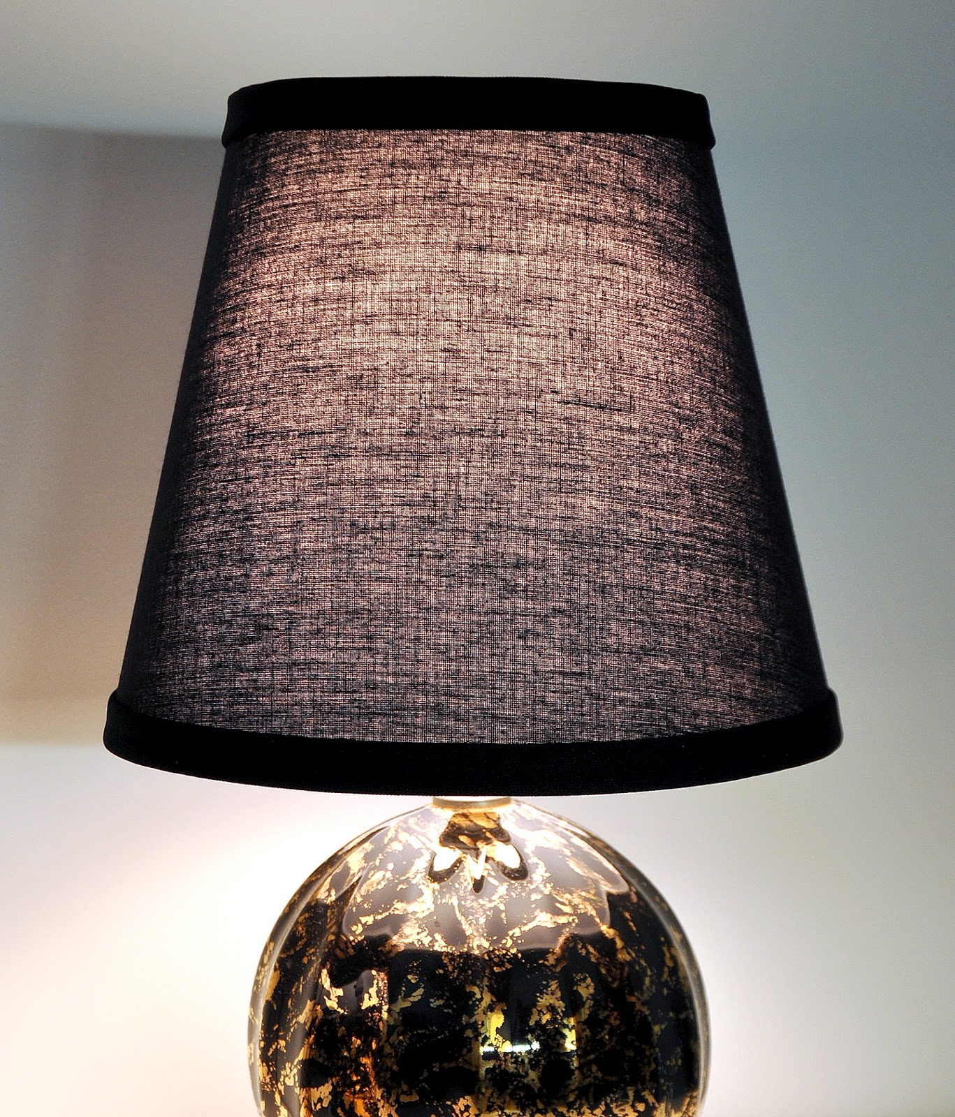 SELECT MODERN Pair of Hollywood Regency Black and Gold Ceramic Brass