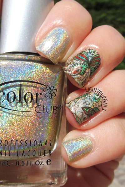 Holographic butterfly nail art