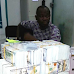 Photos: Man arrested with fake $2.1million at Lagos airport