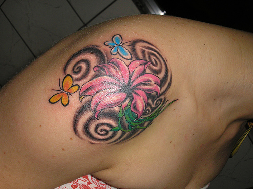 the word love in cursive tattoos FREE TATTOO PICTURES: Beauty of Flower Tattoo Designs