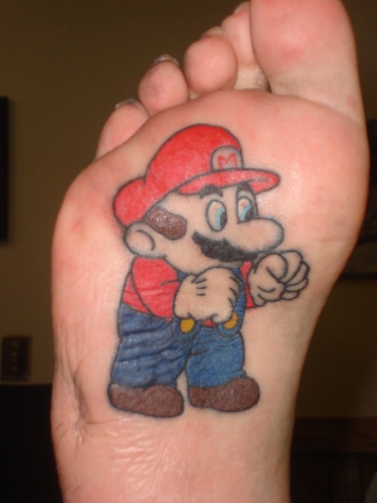 Tattoos Designs Art: Cartoon Character Tattoo