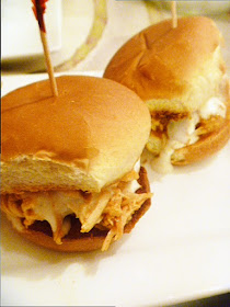 Game Day Eats:  Buffalo Chicken Sliders - Chicken breasts cooked in a buffalo sauce mixture in the slow cooker, to create some succulent filing for your sandwiches. - slice of southern