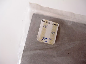 Back of a plastic bag with a David Jones price sticker on it showing a price of 75 cents.