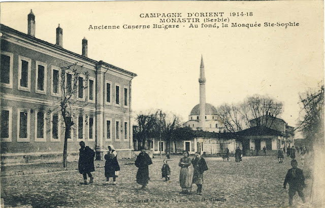 View toward the Municipal building and Isac mosque with the shops along the river Dragor in 1918. The municipal building is shown as a former Bulgarian barrack and Isac mosque is named Hagia Sophia.