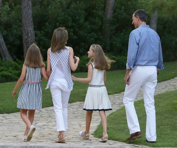 King Felipe, Queen Letizia, Princess Leonor and Princess Sofia at annual 2016 summer photo session photocall 2016. Letizia wore dress, Leonor dress, sofia dress style, fashions