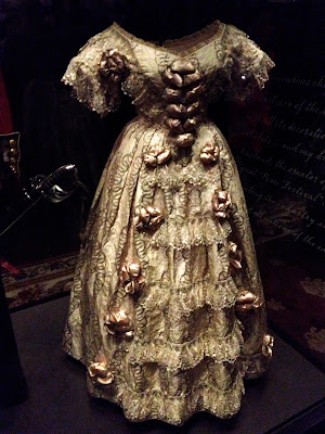A dress from Queen Victoria wedding dress exhibit