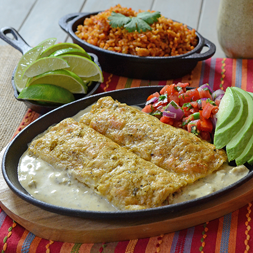 Fire Roasted Pork Enchiladas with Green Chile Cream Sauce