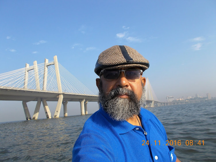 "SELFIE"  with the landmark "Rajiv Gandhi Setu Bridge(Bandra-Worli Sea Link)" behind our boat.