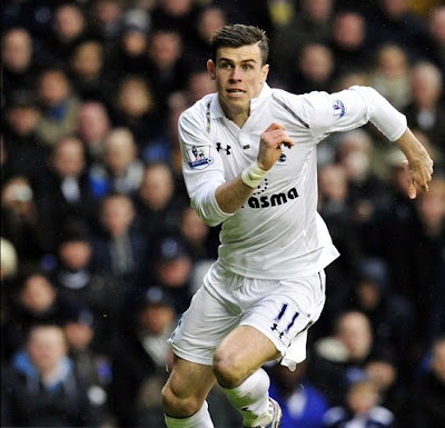 Bale moves in white