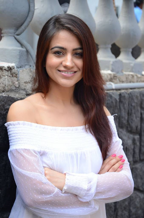 Aksha Pardasany in white dress