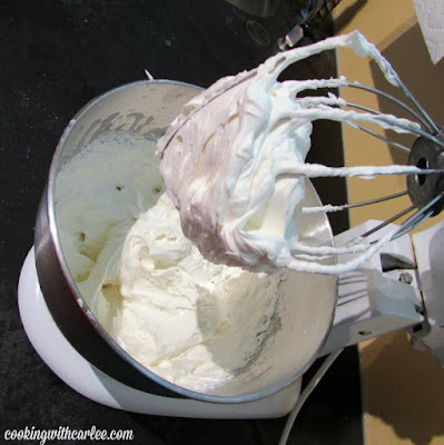 This is heaven, I'm pretty sure! Cream cheese flavor and as light and fluffy as whipped cream. The best of bith worlds from just a few simple ingredients. mixer bowl of cream cheese whipped cream on beater