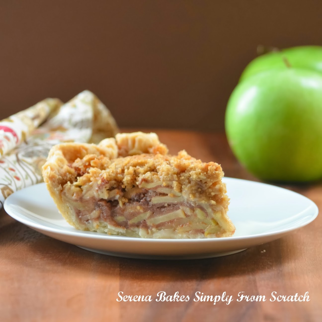 Caramely Apple Pie With Crunch Topping is a fall must have. serenabakessimplyfromscratch.com