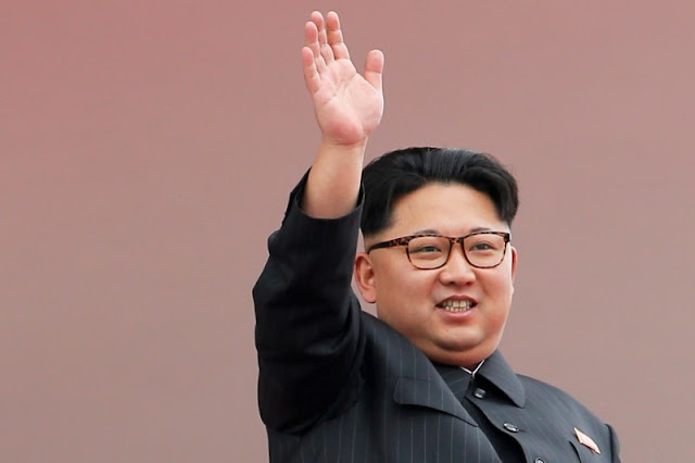 North Korean leader Kim Jong Un waves to the crowd as he presides over a mass rally and parade in the capital's main ceremonial square, in Pyongyang, North Korea, May 10, 2016. REUTERS/Damir Sagolj/File Photo