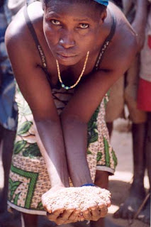 Many people in Africa cannot afford to pay for store bought flour or industrial grain milling and they grind by hand using traditional techniques such as a mortar and pestle.