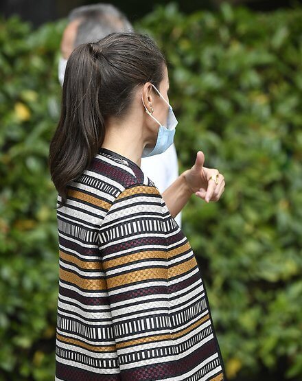 Queen Letizia wore a multicolor tweed jacket by Uterque, and Uterque high heel fabric shoes. gold earrings Boss sweater