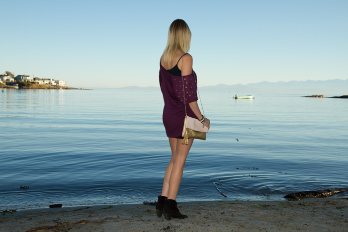 Vancouver Fashion Blogger, Alison Hutchinson, wearing Urban Outfitters studded shoulder burgundy top, bodycon black mini skirt, suede black boots, H&M pink and gold bag, True Worth Design clear quartz crystal pendant necklace, XO Bella skull bead bracelets