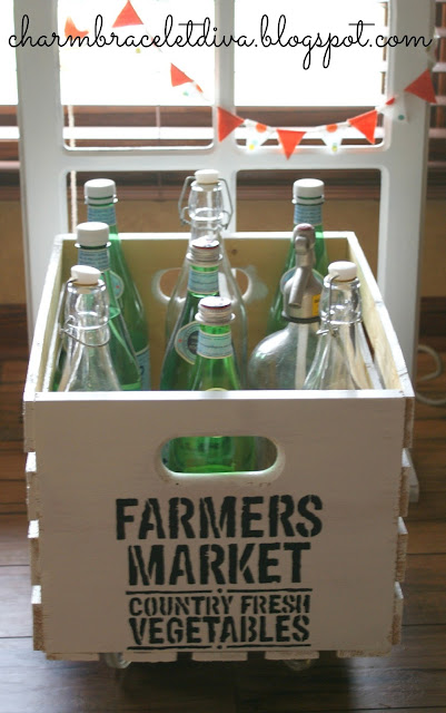 Vintage-inspired rolling pantry cart filled with Pellegrino bottles