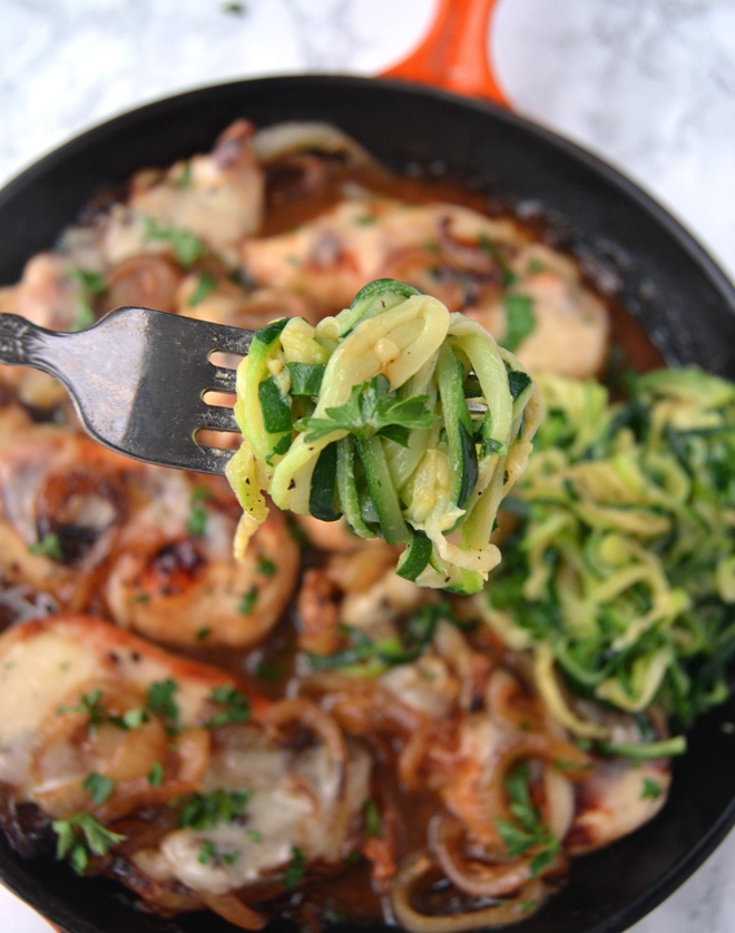 French Onion Chicken and Zoodles takes just 30 minutes to make and features caramelized onions, melted Swiss cheese along with sauteed garlic zucchini noodles. www.nutritionistreviews.com
