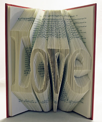 pages folded into the word LOVE