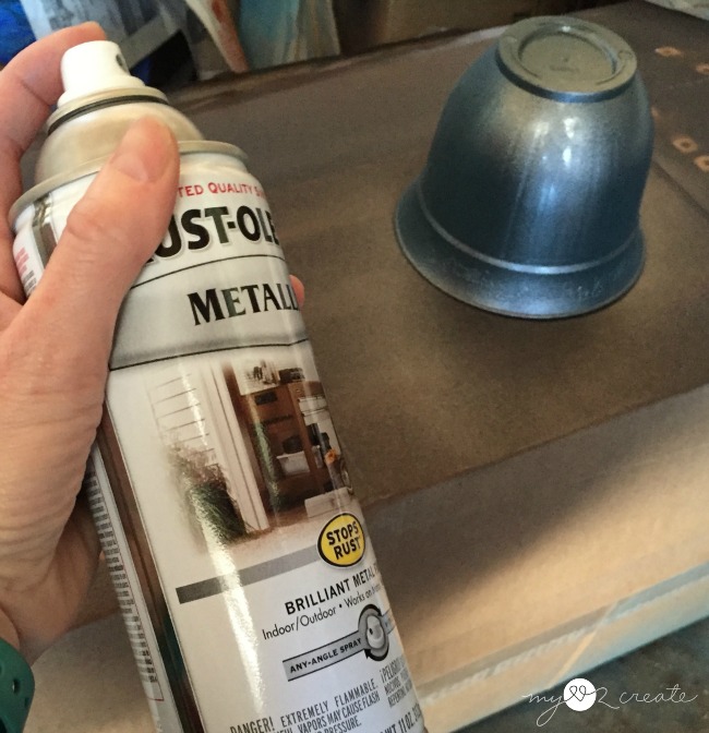 spray painting a plastic pot