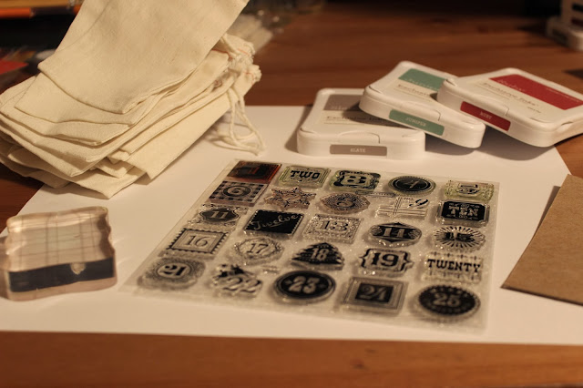 For this project, all you need are some stamp stencils, ink pads, and muslin bags