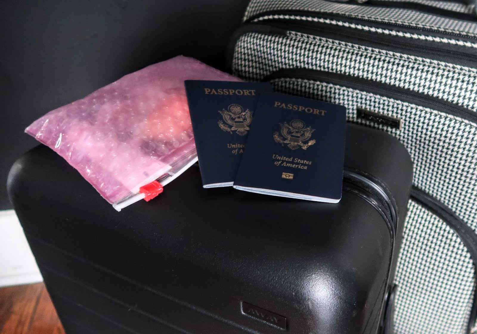 travel away suitcase herringbone glossier passport vacation wanderlust