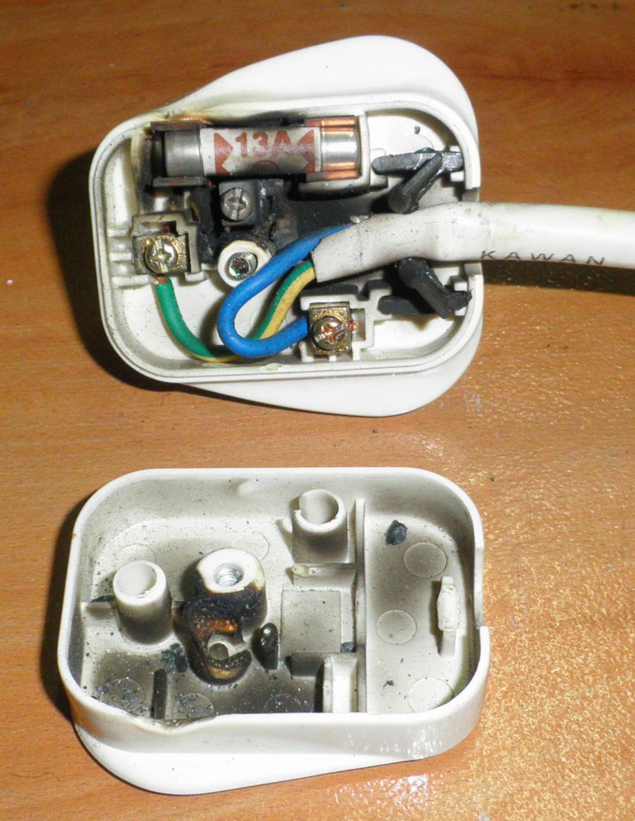 IT SCHEISS Shoddy Workmanship Results in Burnt Electrical Plug