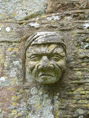 stone carved face