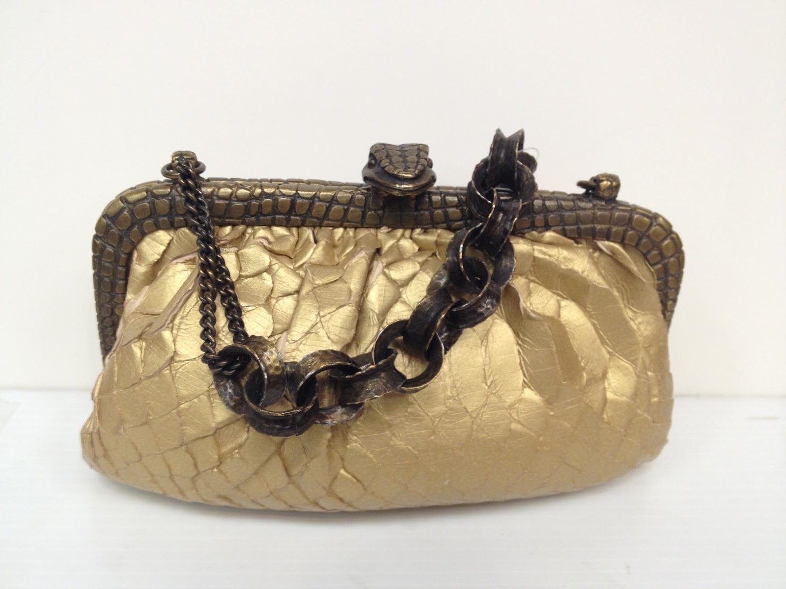Past & Present Designer Consignment Boutique: Gold Snake Clutch