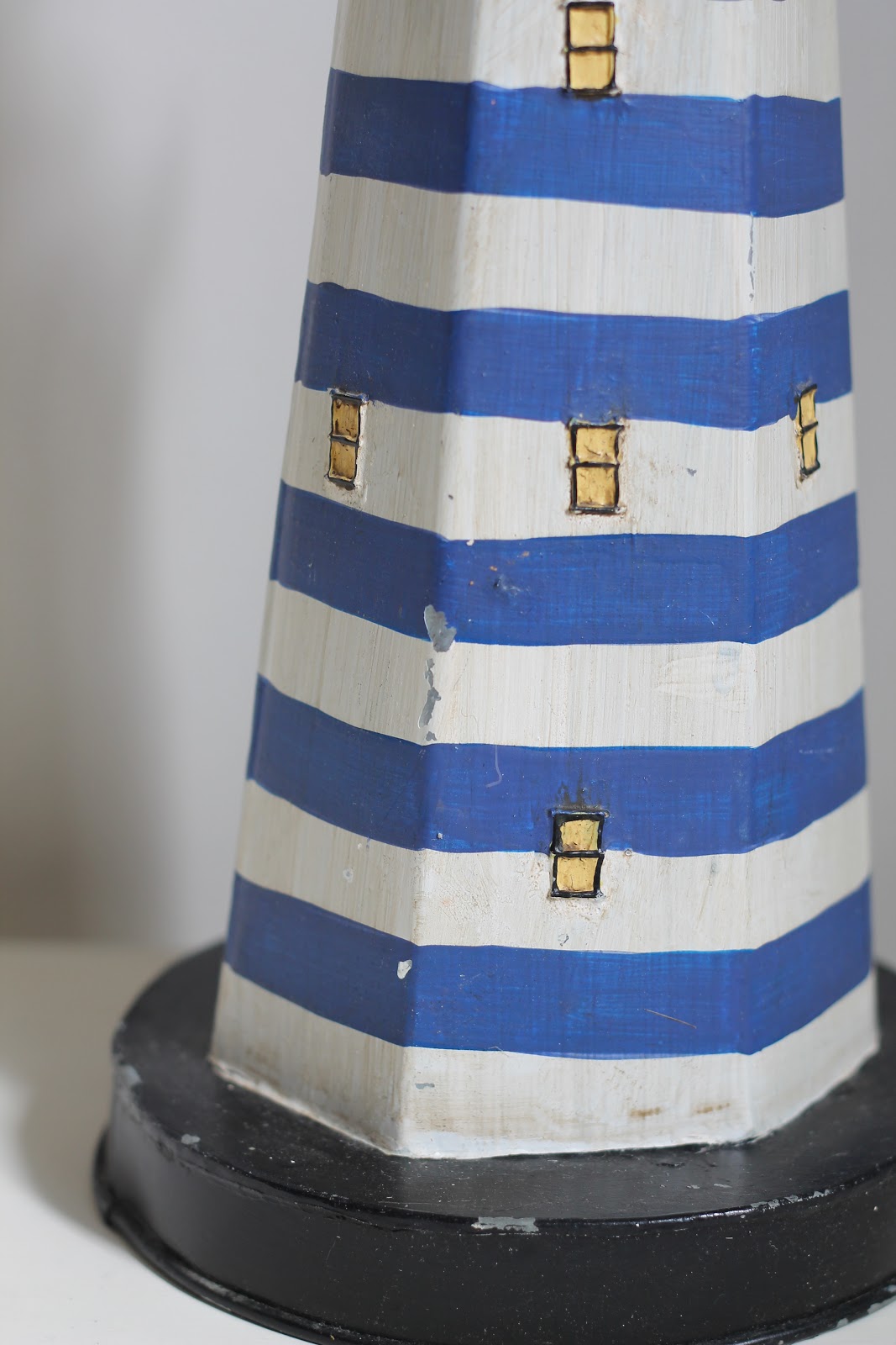 Walrus: Vintage Metal Hand-Painted Lighthouse