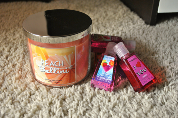 Bath & BodyWorks Peach Bellini candle, sanitizer, Berry Sangria, Bouquet, Aloha Orchid, Fresh Picked Tangerines, and Fresh Picked First Bloom