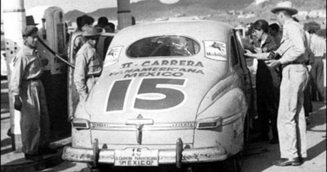 Just A Car Guy Troy Ruttman and Clay Smith in a used car lot Mercury
